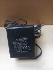 AC ADAPTER. MODWL AD-0901000AK. INPUT 230V AC 50HZ. OUTPUT 9V AC