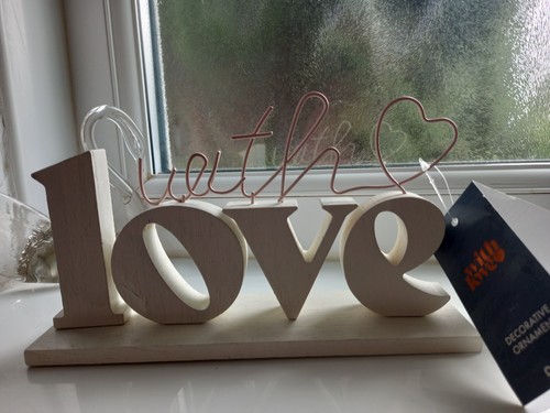 Next with love slogan - next, "with