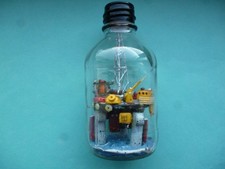 Oil Rig in bottle.Old vintage.
