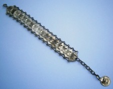 N505) Vintage Silver Tone Coin