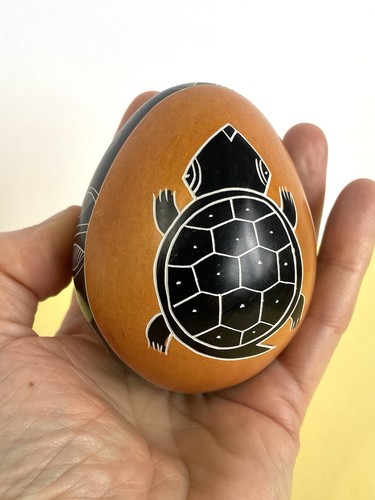 Alabaster egg hand - hand, etched