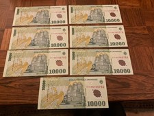 7 x 10,000 Romania Lei banknotes. UNC Consecutive Serial Nos