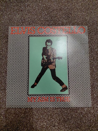 Elvis costello aim is - elvis,