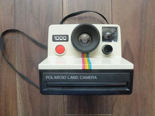 Polaroid land camera 1000 - 1000, red