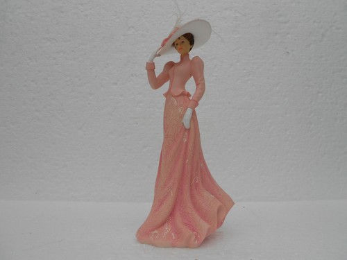 Faithful pink figurine - to,