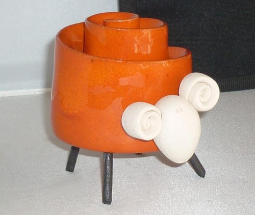 Unusual hand made orange - hand,