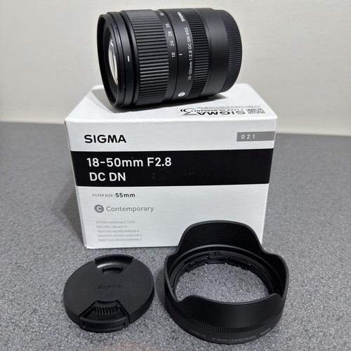 Sigma 50mm dc - 18-50mm,