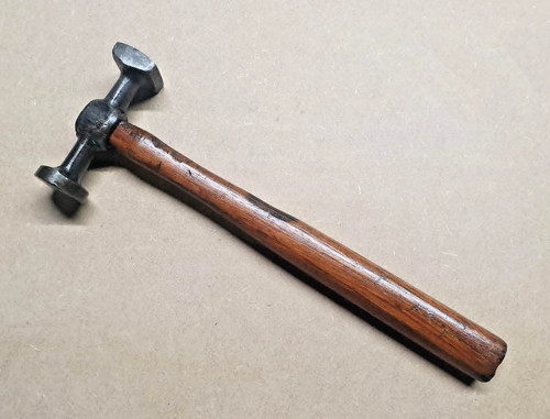 Vintage panel beating - panel, hammer