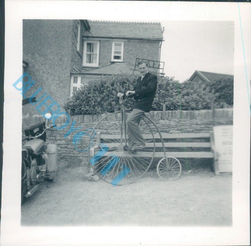 Man penny farthing - man,