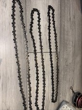 1x stihl chain 72DL for 18” i believe and 2x Husquarvana chains 64DL for 15” bar