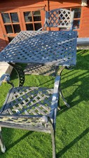Cast Metal Very HEAVY garden furniture: table and 2 chairs