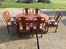 An oriental hardwood dining