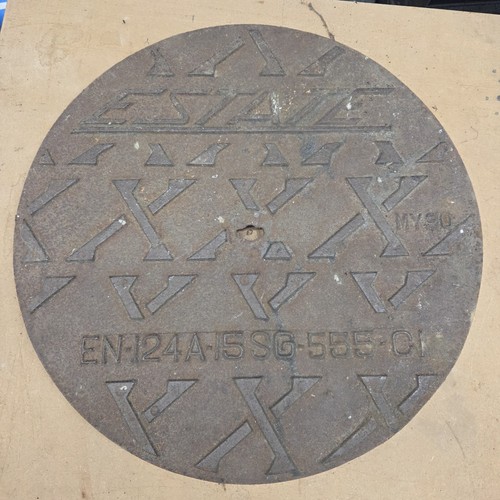 Round cast iron manhole cover - cast,