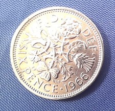 Polished silver sixpence - polished,