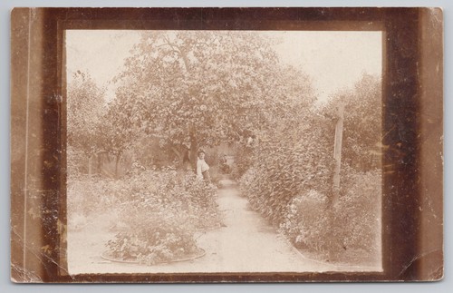 Rppc woman garden path - rppc, in