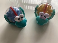 Push Along Snail Toy Bundle of Two Rattle Noise Makers