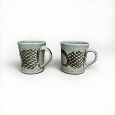 Studio pottery mugs pair