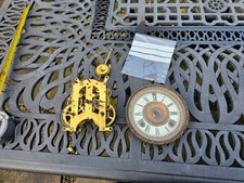 Antique 8 day ANSONIA  clock movement PORCELAIN dial. pendulum GOOD CAST BEZEL