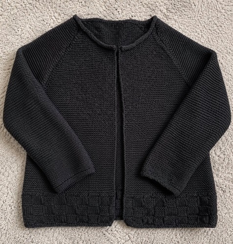 Hand knitted black aran - hand, wool