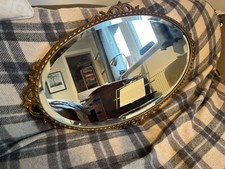 Vintage wall mirror . Oval