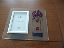 Et cetera photo frame on a glass mount with leaded tulip design.