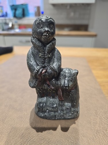 Inuit child and wolf cub - child,