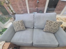 NEARLY NEW TWO SEATER SOFA BED WITH FOOTSTOOL