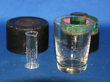 An antique medicine glass and