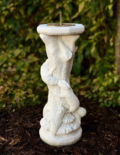 Outdoor plinth figurine