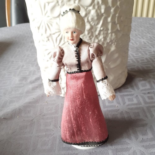 Hand dressed dolls house - dressed,