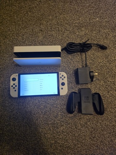 Nintendo switch oled 64gb - nintendo,