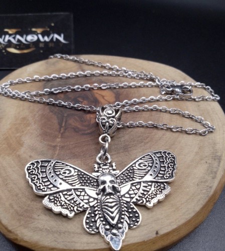 Silvertone death moth pendant