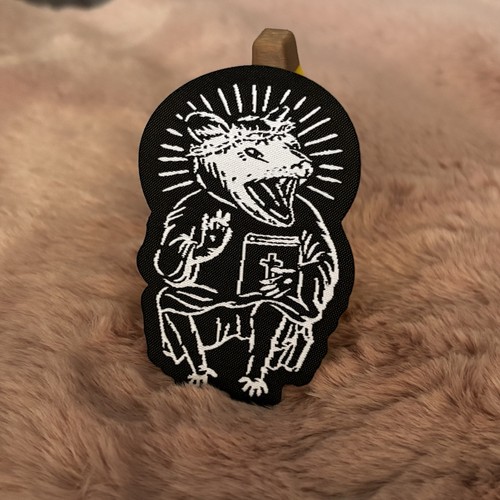 Screaming possum priest iron - screaming,