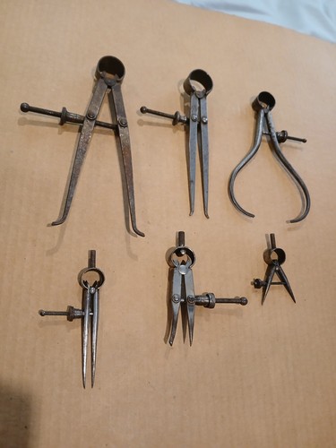 Six antique calipers - six, inside
