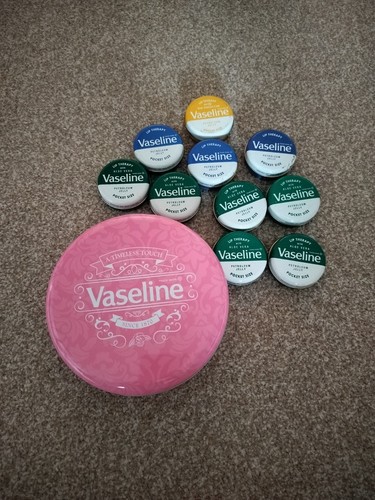 Empty vaseline tins - empty,