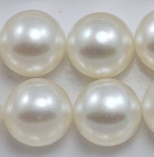 White button half - button, half-drilled