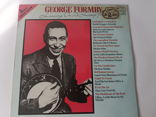 George formby leaning on a - -,
