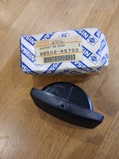 Datsun Violet A10, rear door ashtray In Black,new genuine part. 