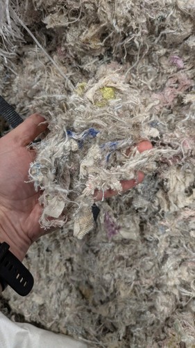 Shredded textiles punch bag - textiles,
