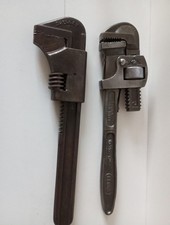 A PAIR OF VINTAGE WRENCHES