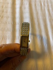 Small gold Swarovski watch