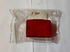 NOS VELO SPORT KAWASAKI AR/KE125 KL250 REAR BRAKE LIGHT LENS 23026-1009 (ROY)