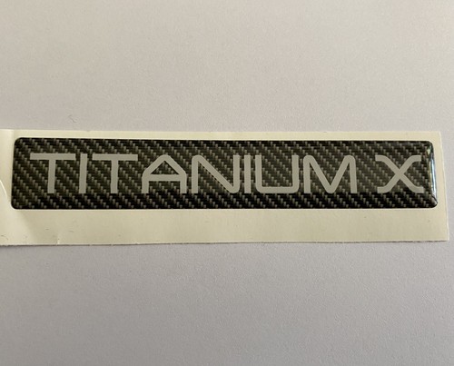 Titanium car boot wing - x, badge