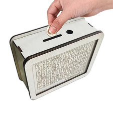 Wooden money box with - money,