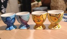 4 vintage egg cups 1990s cartoon animals cat dog elephant seal