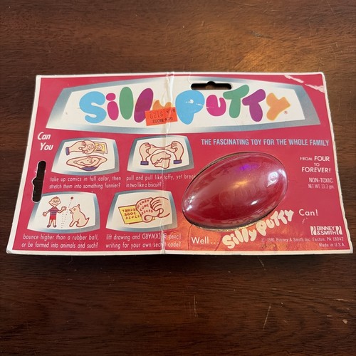 New carded vintage silly putty - new,