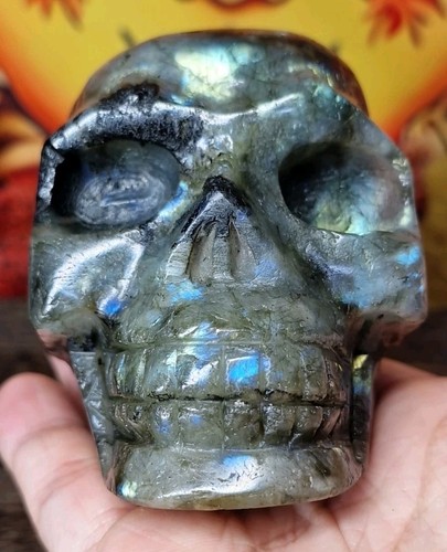 Hand carved labradorite with - hand,