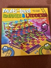 Happy Puzzle Company Multi-Level Snakes & Ladders Board Game Complete