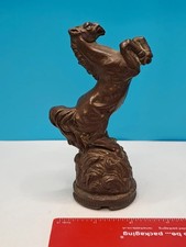 vintage sculpture of a rearing
