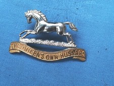 The Queens Own Hussars Officers silver/gilt cap badge.